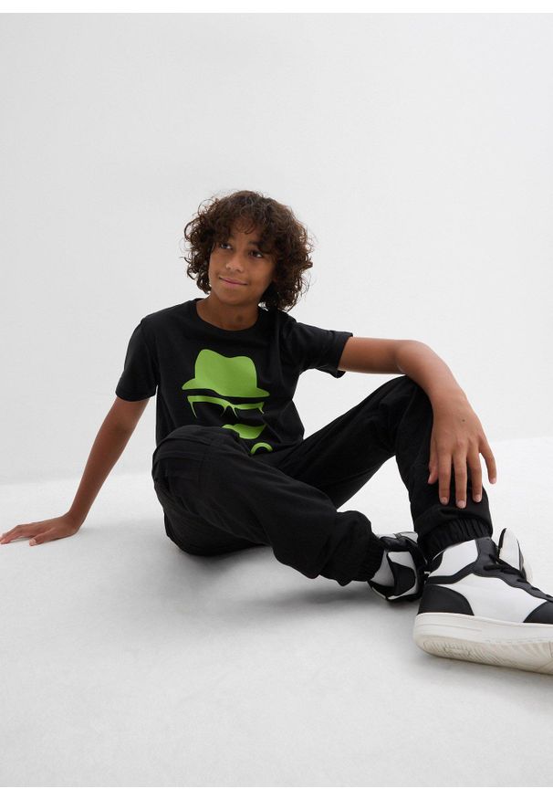 bonprix - Spodnie ocieplane chłopięce z gumką w talii, regular fit. Kolor: czarny