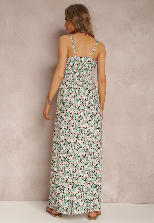 Renee - Zielona Sukienka Alethyxo. Kolor: zielony. Materiał: bawełna, tkanina. Wzór: kwiaty. Typ sukienki: kopertowe, rozkloszowane. Długość: maxi