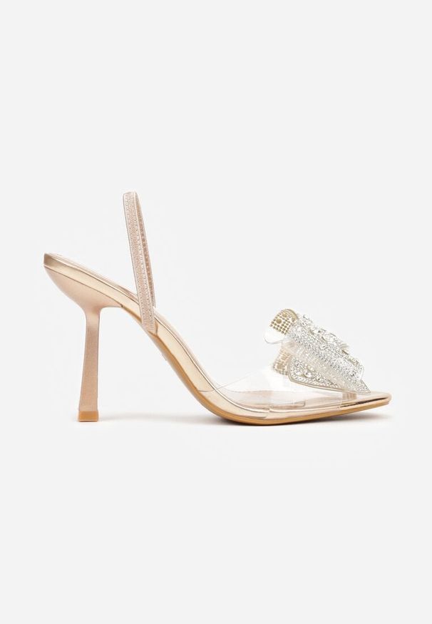 Born2be - Szampańskie Sandały na Szpilce z Transparentnym Paskiem i Kokardką z Cyrkoniami Celesti. Okazja: na imprezę. Zapięcie: pasek. Kolor: złoty. Obcas: na szpilce. Styl: klasyczny