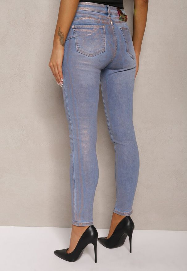 Renee - Jasnoniebieskie Jeansy Skinny z Przejaśnieniami ze Złotej Farby Tilacema. Okazja: na co dzień. Kolor: niebieski. Styl: wizytowy, elegancki, casual