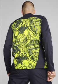 Puma - Męska bluza przedmeczowa z zamkiem 1/4 Manchester City PUMA. Kolor: niebieski, żółty, wielokolorowy