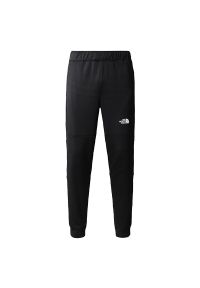 Spodnie The North Face Mountain Athletics Fleece 0A823UJK31 - czarne. Kolor: czarny. Materiał: dzianina, poliester. Sport: fitness