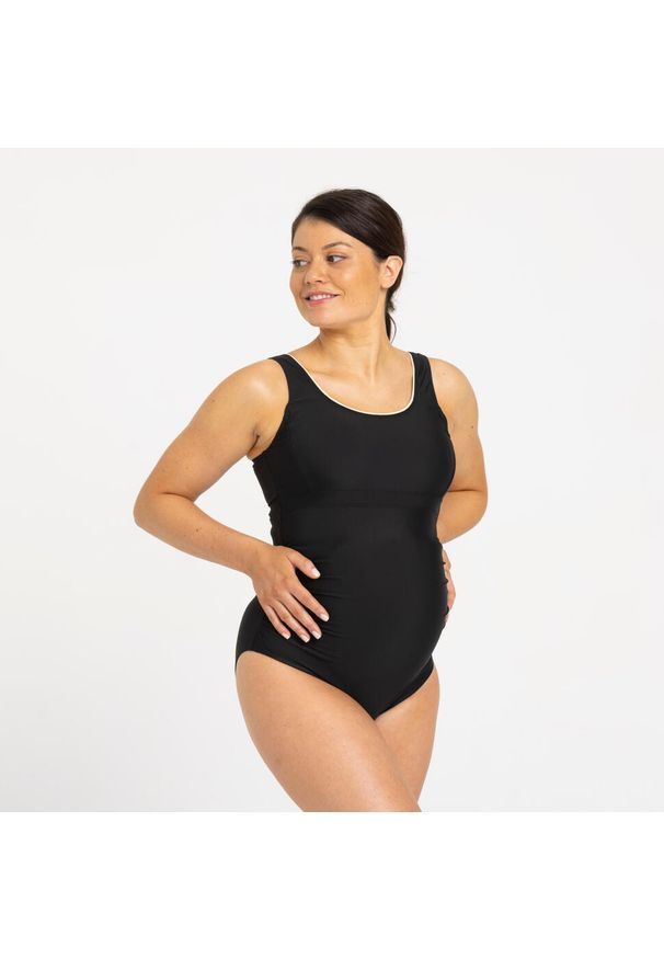 Decathlon - Strój jednoczęściowy kąpielowy ciążowy damski Nabaiji Nora. Kolekcja: moda ciążowa. Kolor: beżowy, wielokolorowy, czarny. Materiał: poliester, poliamid, materiał, elastan