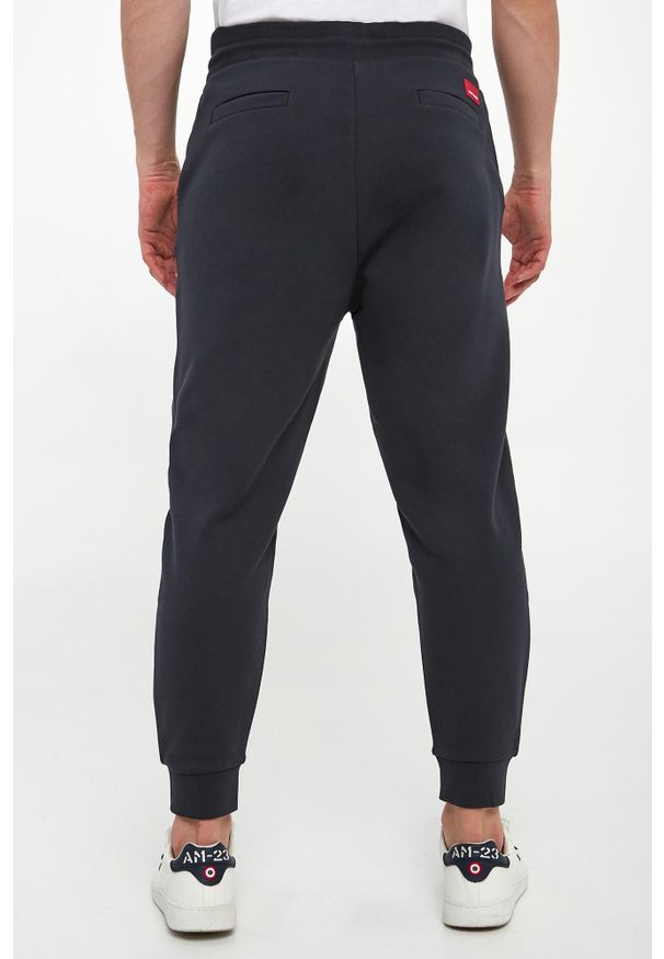 JOOP! Jeans - Spodnie dresowe męskie Silvan JOOP! JEANS. Materiał: dresówka