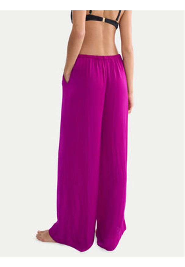 Triumph Spodnie materiałowe Summer 10227246 Różowy ciemny Wide Leg. Kolor: różowy. Materiał: syntetyk