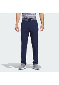 Adidas - Spodnie Ultimate365 Tapered Golf. Kolor: niebieski. Materiał: materiał. Sport: golf