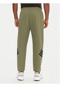 Adidas - adidas Spodnie dresowe Future Icons 3-Stripes JD4891 Zielony Loose Fit. Kolor: zielony. Materiał: syntetyk #4