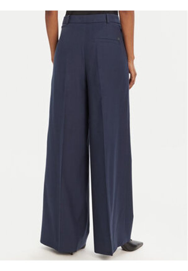 Hugo - HUGO Spodnie materiałowe Harenau 50542606 Granatowy Relaxed Fit. Kolor: niebieski. Materiał: bawełna