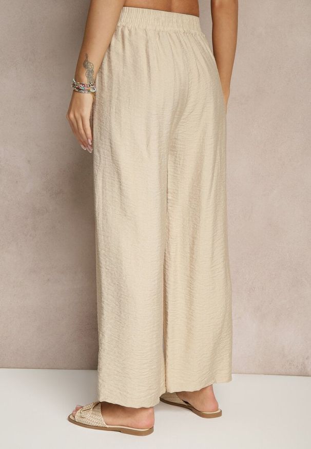 Renee - Beżowe Szerokie Spodnie High Waist z Wiskozy z Gumką w Talii Lannalie. Okazja: na co dzień. Stan: podwyższony. Kolor: beżowy. Materiał: wiskoza. Styl: elegancki, casual