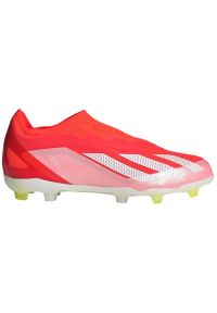 Adidas - Buty piłkarskie adidas X Crazyfast Elite Ll Fg Jr IF0672 czerwone. Zapięcie: pasek. Kolor: czerwony. Materiał: materiał. Szerokość cholewki: normalna. Wzór: paski. Sport: piłka nożna #1