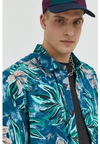 Volcom koszula męska kolor niebieski regular z kołnierzykiem klasycznym. Typ kołnierza: kołnierzyk klasyczny. Kolor: niebieski. Materiał: tkanina. Długość rękawa: krótki rękaw. Długość: krótkie. Styl: klasyczny #2