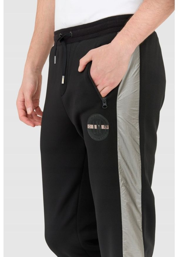 La Martina - LA MARTINA Czarne męskie spodnie Slim Fit. Kolor: czarny. Materiał: poliester