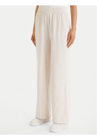 TOMMY HILFIGER - Tommy Hilfiger Spodnie dresowe UW0UW06180 Beżowy Wide Leg. Kolor: beżowy. Materiał: bawełna #1