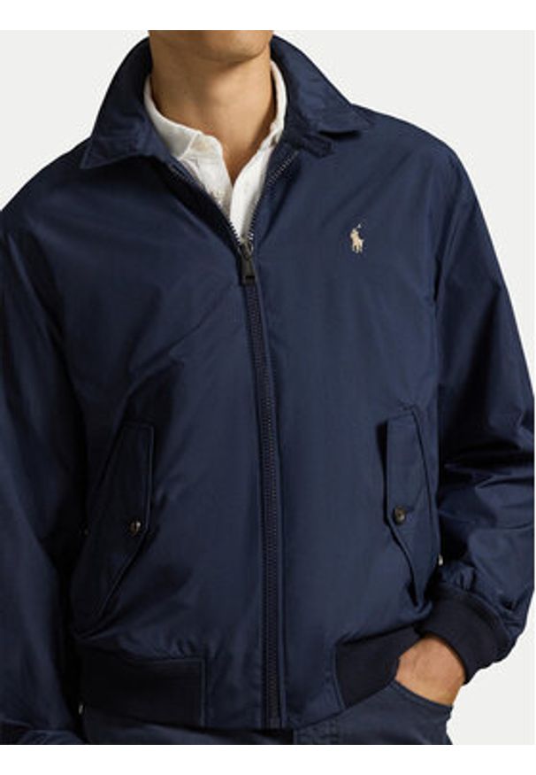 Polo Ralph Lauren Kurtka przejściowa 710970434001 Granatowy Regular Fit. Typ kołnierza: polo. Kolor: niebieski. Materiał: syntetyk