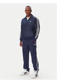 Adidas - adidas Spodnie dresowe Firebird Woven KE1370 Granatowy Regular Fit. Kolor: niebieski. Materiał: syntetyk #2