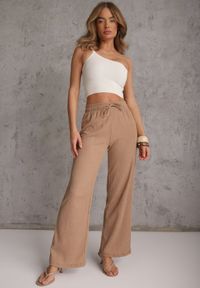 Renee - Beżowe Teksturowane Spodnie Wide Leg z Wiązaniem w Talii Pirethei. Kolor: beżowy. Materiał: materiał. Styl: elegancki #1