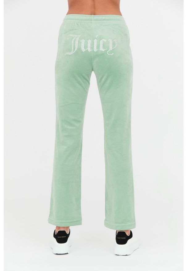 Juicy Couture - JUICY COUTURE Seledynowe spodnie dresowe Tina. Kolor: niebieski. Materiał: dresówka