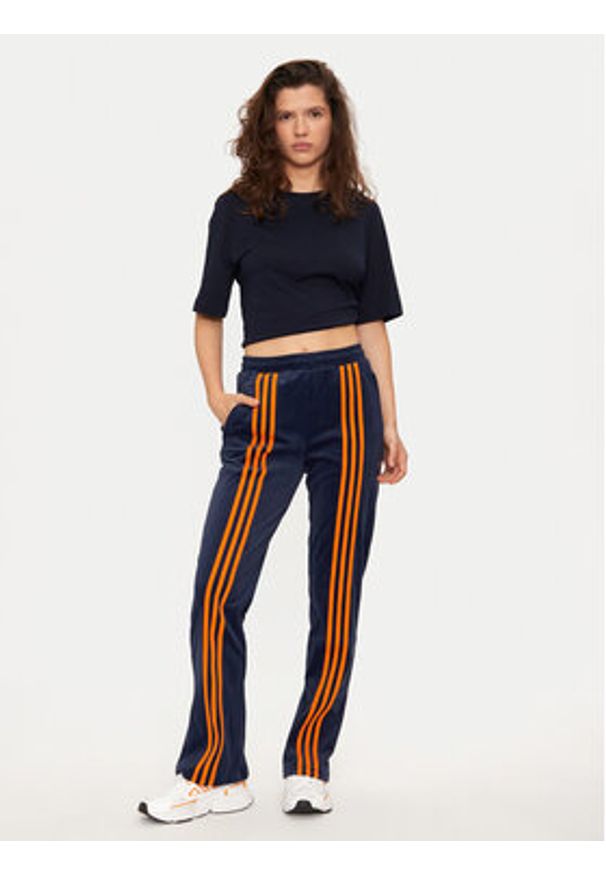 Adidas - adidas Spodnie dresowe Velour JN8290 Granatowy Regular Fit. Kolor: niebieski. Materiał: syntetyk