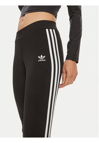 Adidas - adidas Legginsy IN1100 Czarny Flared Fit. Kolor: czarny. Materiał: syntetyk #4