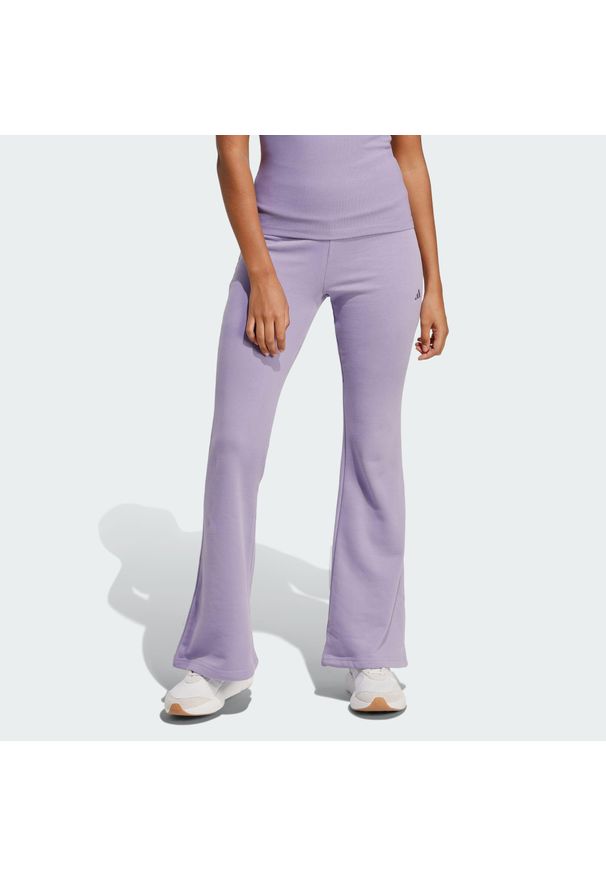 Adidas - Spodnie Seasonal Essentials French Terry Flared. Kolor: fioletowy, wielokolorowy, różowy. Sport: fitness