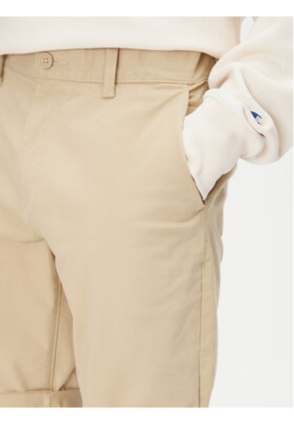 Tommy Jeans Szorty materiałowe Scanton DM0DM21950 Beżowy Slim Fit. Kolor: beżowy. Materiał: bawełna
