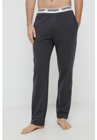 Superdry Spodnie piżamowe męskie kolor szary melanżowa. Kolor: szary. Materiał: dzianina, bawełna. Wzór: melanż
