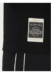Champion Polo 221044 Czarny Regular Fit. Typ kołnierza: polo. Kolor: czarny. Materiał: bawełna