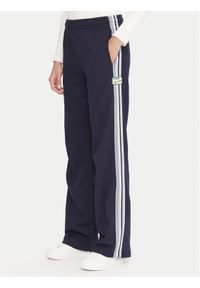 Lacoste Spodnie dresowe XF5250 Granatowy Regular Fit. Kolor: niebieski. Materiał: dresówka