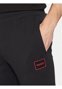 Hugo Spodnie dresowe 50525246 Czarny Regular Fit. Kolor: czarny. Materiał: bawełna #5