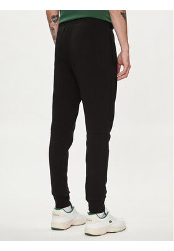 Lacoste Spodnie dresowe XH9624 Czarny Regular Fit. Kolor: czarny. Materiał: bawełna