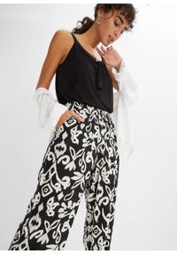 bonprix - Spodnie Marlena z nadrukiem, z lejącej wiskozy. Kolor: czarny. Materiał: wiskoza. Wzór: nadruk #2