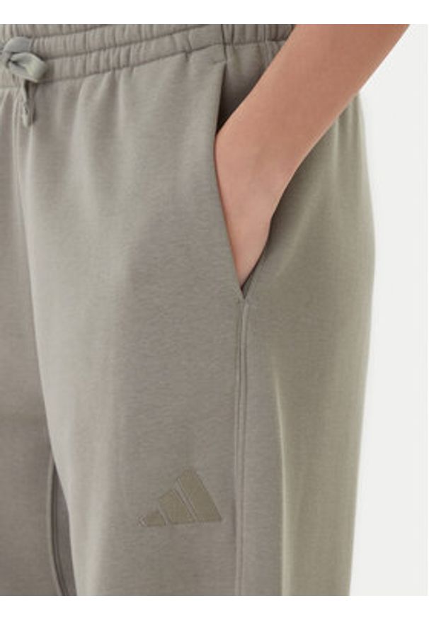 Adidas - adidas Spodnie dresowe ALL SZN Fleece JY5014 Beżowy Wide Leg. Kolor: beżowy. Materiał: bawełna