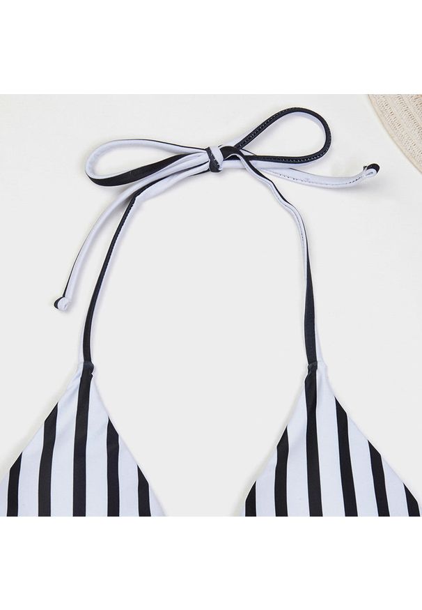 Intica - Bikini z wiązaniem i szortami na lato Cannelle. Kolor: wielokolorowy. Materiał: materiał