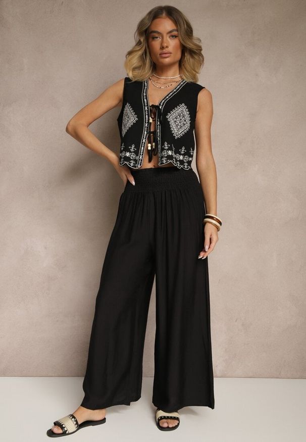 Renee - Czarne Spodnie z Wiskozą o Szerokim Kroju High Waist Orrana. Okazja: na co dzień. Stan: podwyższony. Kolor: czarny. Materiał: wiskoza. Styl: casual, elegancki