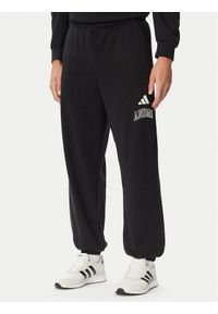 Adidas - adidas Spodnie dresowe Seasonal Essentials Collegiate French Terry Cuffed KF4264 Czarny Regular Fit. Kolor: czarny. Materiał: bawełna #1