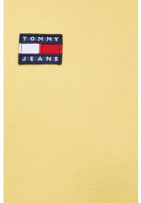 Tommy Jeans bluza bawełniana damska kolor żółty z kapturem gładka. Okazja: na co dzień. Typ kołnierza: kaptur. Kolor: żółty. Materiał: bawełna. Długość rękawa: długi rękaw. Długość: długie. Wzór: gładki. Styl: casual