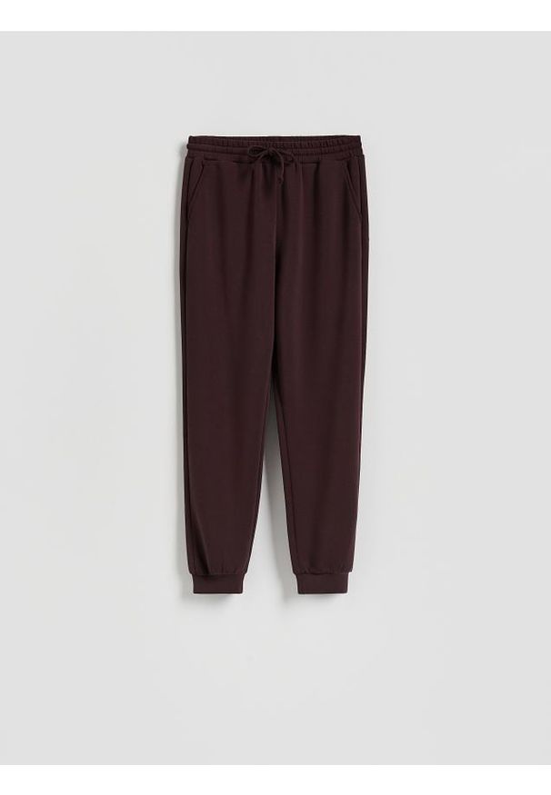 Reserved - Dresowe joggery - ciemnofioletowy. Kolor: fioletowy. Materiał: dresówka