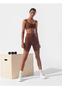 4f - Legginsy kolarki treningowe z materiałów z recyklingu damskie 4F x Anna Lewandowska. Stan: podwyższony. Kolor: brązowy. Materiał: materiał. Wzór: nadruk. Sport: fitness