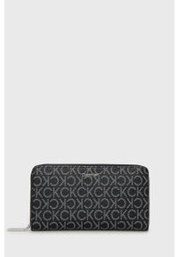 Calvin Klein portfel damski kolor czarny. Kolor: czarny. Materiał: materiał