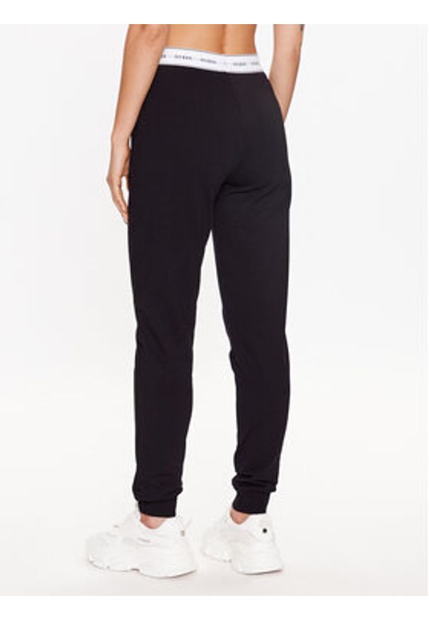 Guess Spodnie piżamowe O3YB00 KBS91 Czarny Regular Fit. Kolor: czarny. Materiał: bawełna