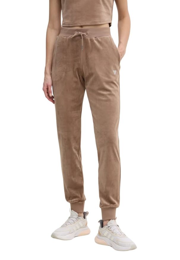 Guess - GUESS Brązowe damskie spodnie welurowe Couture. Kolor: brązowy. Materiał: welur