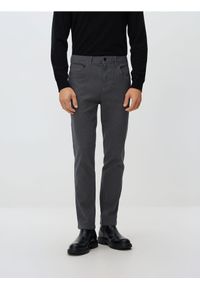 Reserved - Bawełniane spodnie slim fit - czarny. Kolor: czarny. Materiał: bawełna