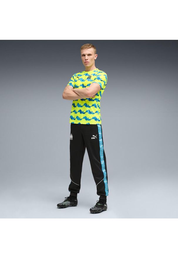 Puma - Koszulka rozgrzewkowa OM 2025/26. Kolor: żółty. Sport: piłka nożna