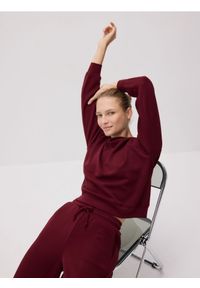 Reserved - Spodnie z szeroką nogawką - bordowy. Kolor: czerwony. Materiał: dzianina #1