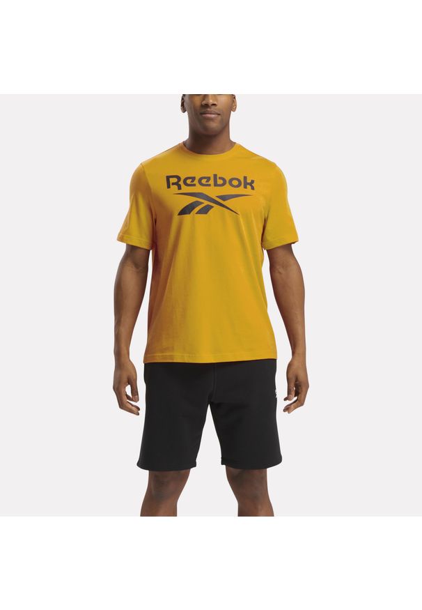 Koszulka fitness męska Reebok krótki rękaw. Kolor: żółty. Materiał: bawełna. Długość rękawa: krótki rękaw. Długość: krótkie. Sport: fitness