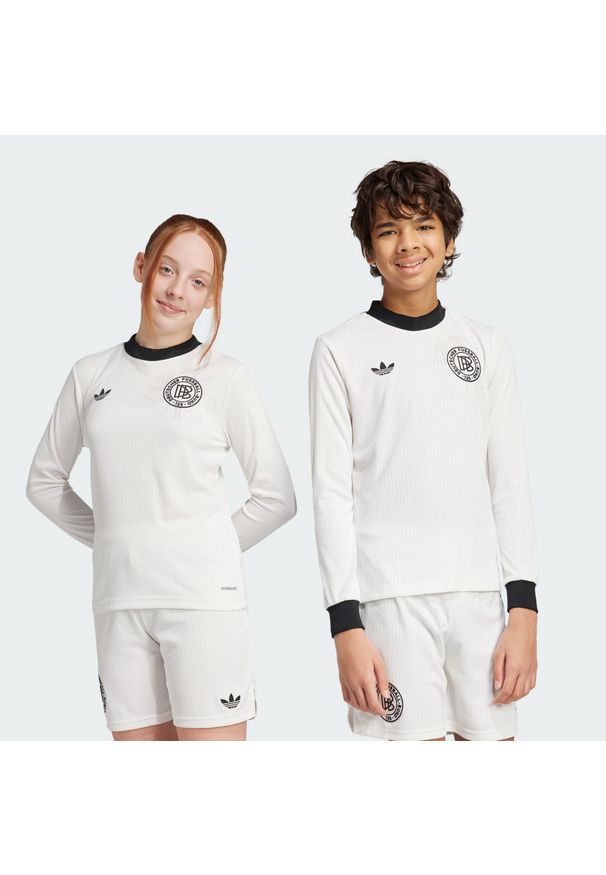 Adidas - Koszulka Germany Anniversary Long Sleeve Kids. Kolor: biały, wielokolorowy, czarny. Materiał: materiał. Długość rękawa: długi rękaw