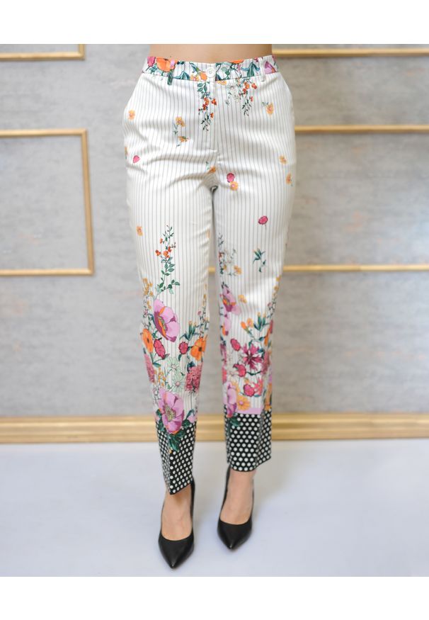 CRISTINAEFFE MILANO - Spodnie w kwiatowy print. Kolor: beżowy. Wzór: kwiaty, nadruk. Sezon: wiosna. Styl: klasyczny
