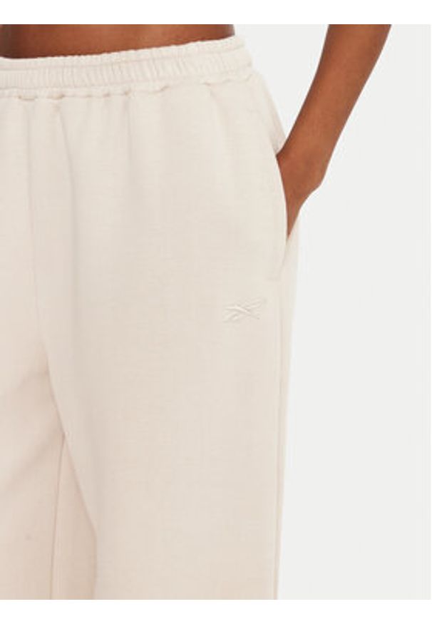 Reebok Spodnie dresowe Reebok X Ewa Chodakowska RK25306CCW Beżowy Regular Fit. Kolor: beżowy. Materiał: bawełna, syntetyk