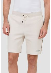 Guess - GUESS Beżowe męskie spodenki Mickey Cuff Pant, Rozmiar S. Kolor: beżowy #1