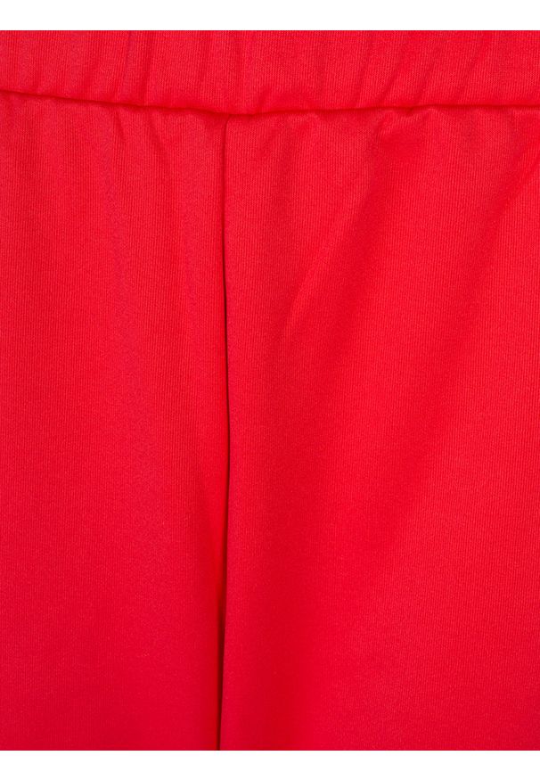 Juicy Couture Spodnie "Track" | JWTKB179665 | Track Pant | Kobieta | Czerwony. Okazja: na co dzień. Kolor: czerwony. Materiał: poliester. Wzór: nadruk. Styl: casual